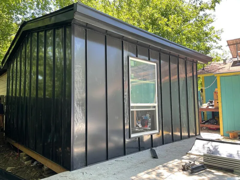 Black standing seam metal wall panels for Metal Roof Installation in Linda