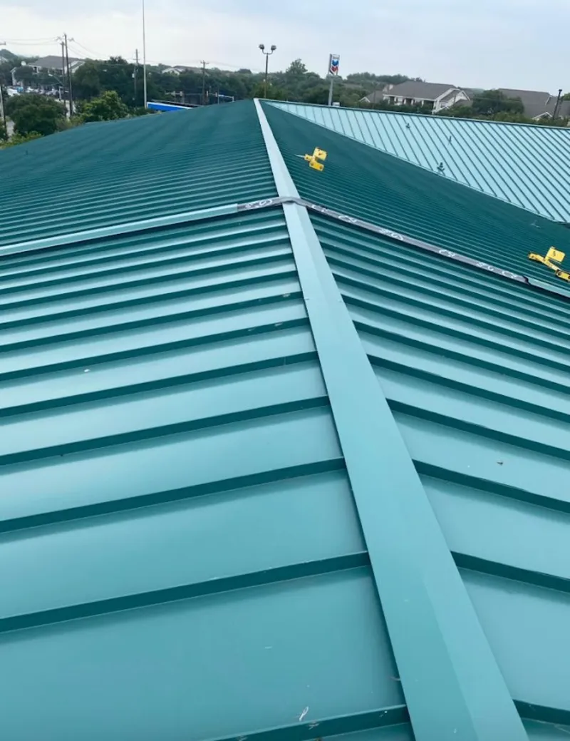 Green commercial metal roof ridge and valley for Metal Roof Repair in Linda